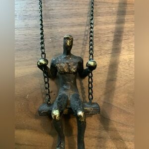 Man on Swing Swinging Resin Sculpture  Gold 10” Metal Stand